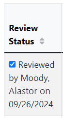 Review Status column showing a selected checkbox and "Reviewed by" with the name and date of the review completion.